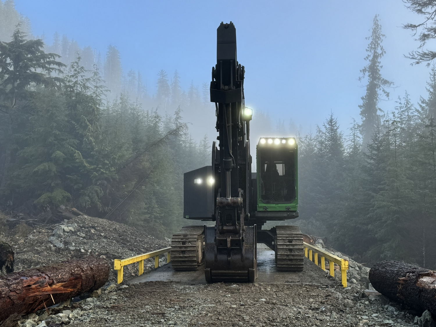 Heavy machinery in foggy forest